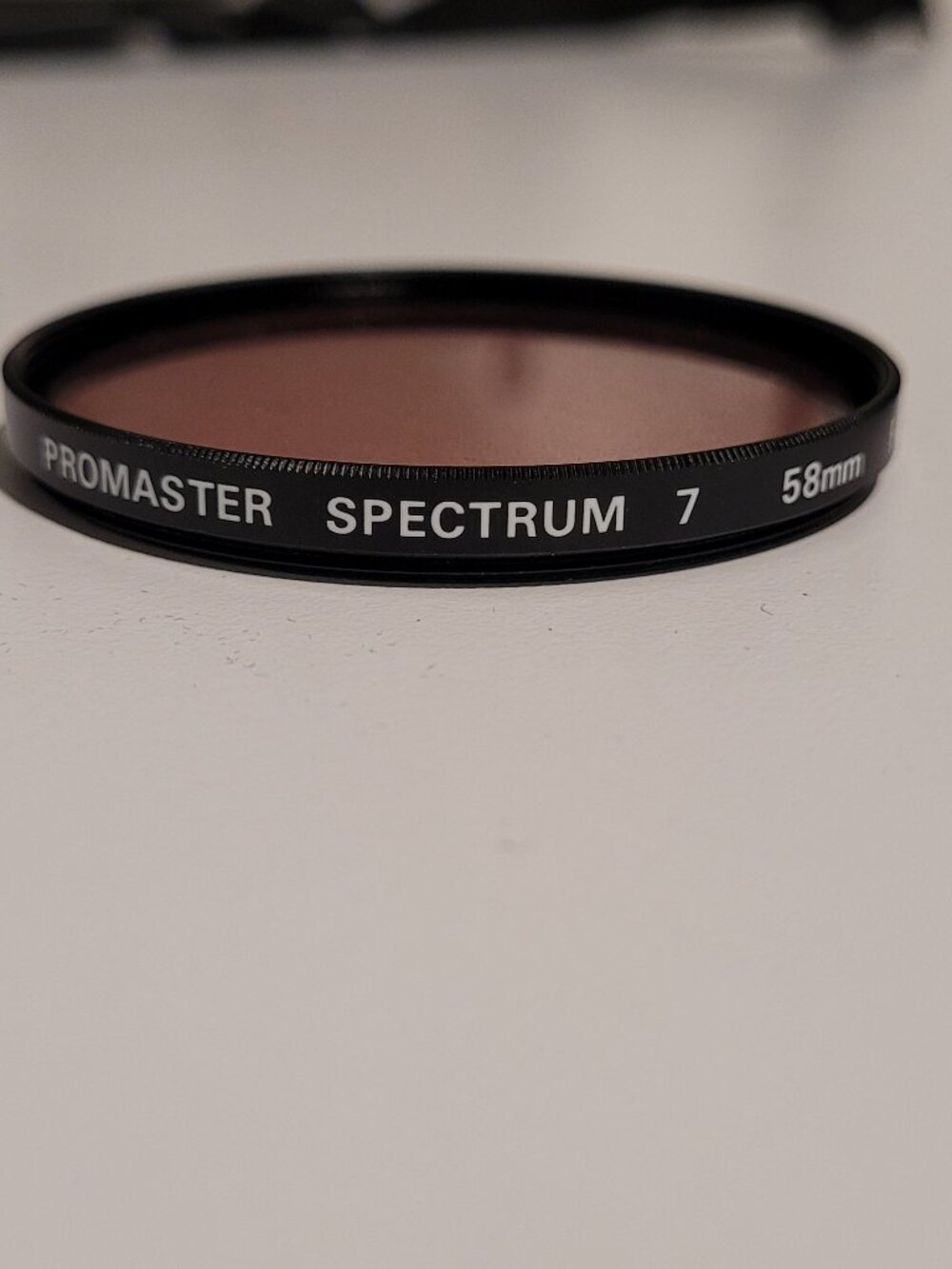 Promaster Spectrum 7 58mm Skylight 1A glass lens filter